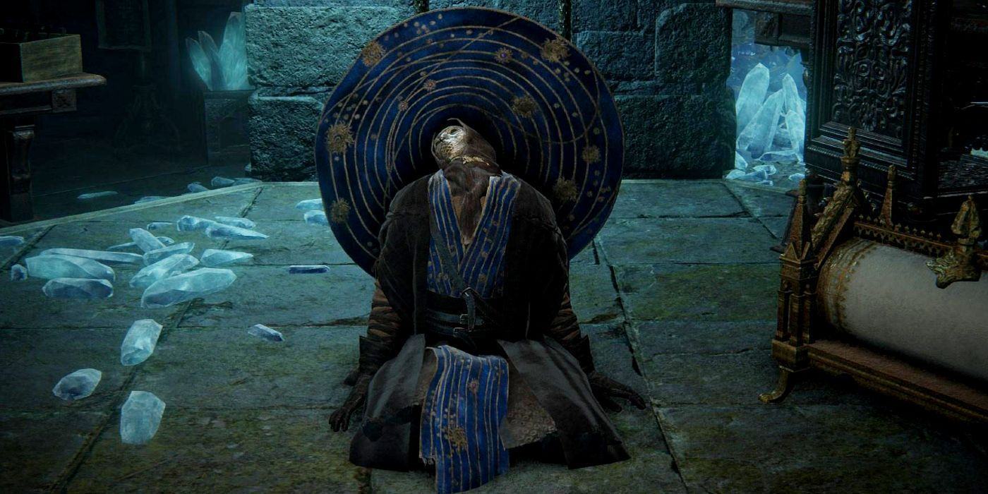 Seluvis Guru kneels at the Elden Ring