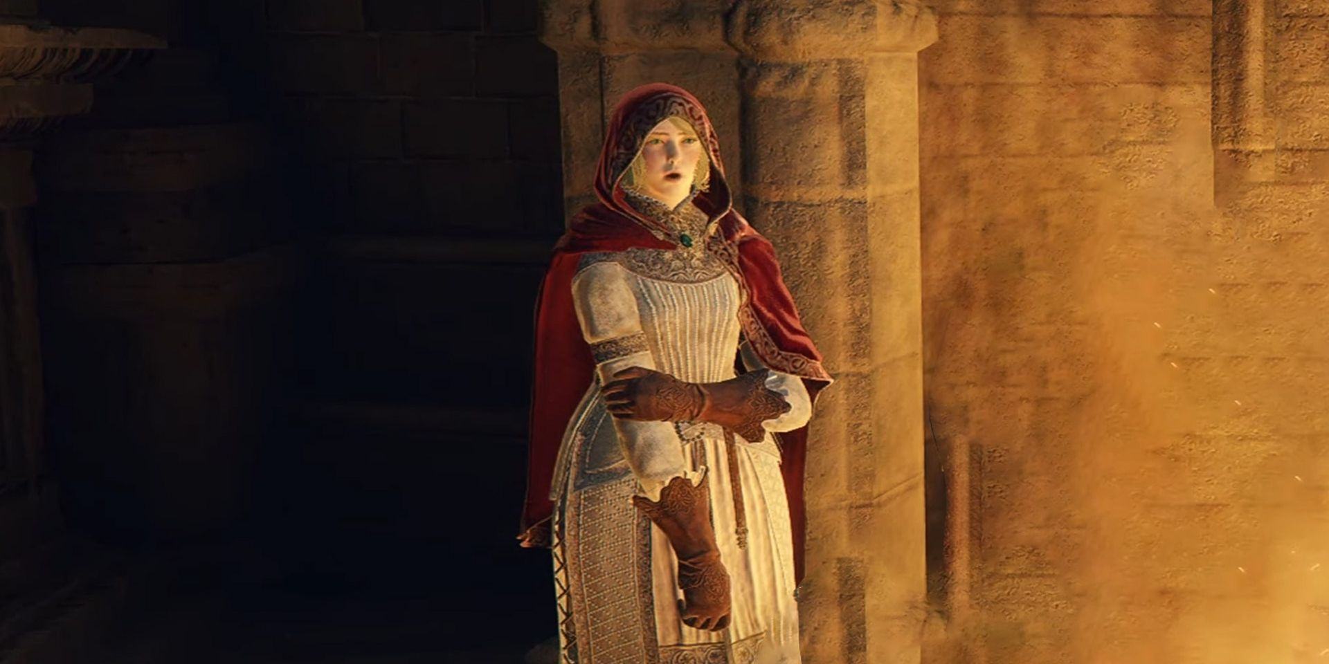 A close-up of Roderika, an NPC from the video game Elden Ring, wearing a white dress and red hooded cloak.