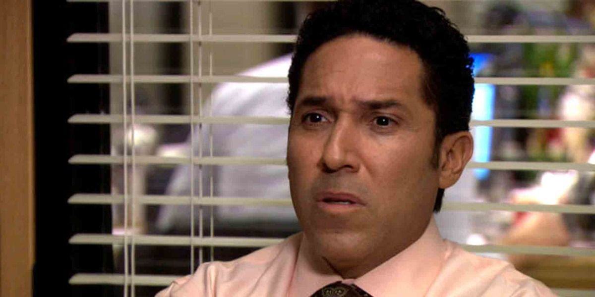 Oscar from The Office looks offended in Michael's office