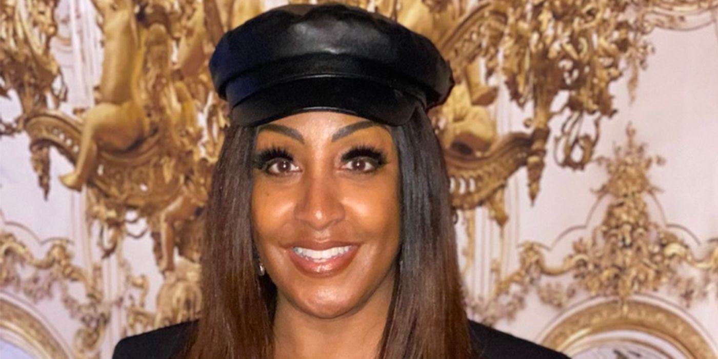 Karen Everett The Family Chantel wearing leather hat