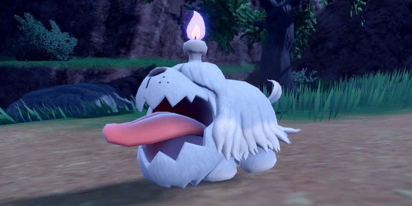 Greavard, a ghost dog Pokémon from Scarlet and Violet with a huge tongue and candle on its head.