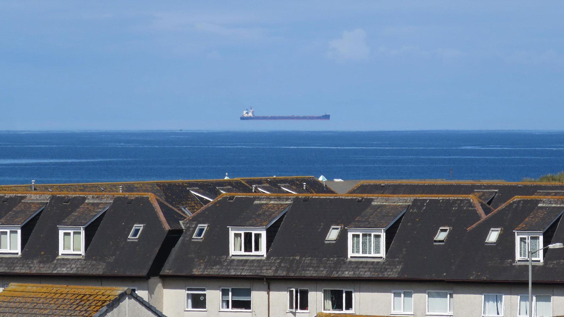 Mind-bending optical illusion shows massive tanker floating in the sky – but there’s an explanation