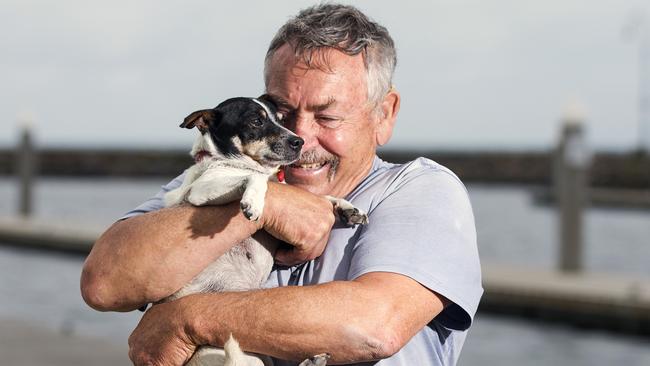 The fisherman meets his dog again, which he thought was lost in the sea