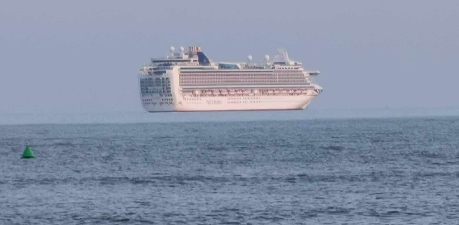 Another mind-bending photo shows ship 'floating in the sky' thanks to bizarre optical illusion