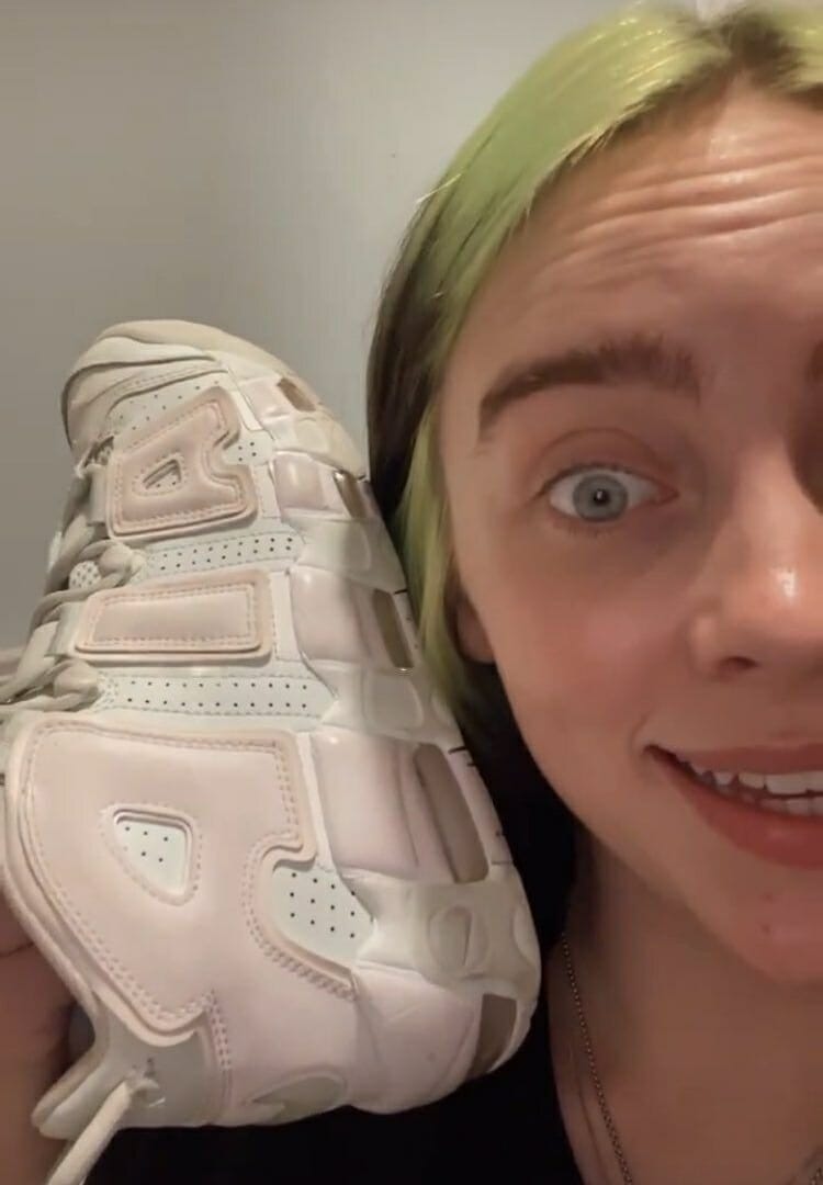 Billie Eilish shares photo of her new trainers and no-one can agree on the colour… so do YOU see pink or green?