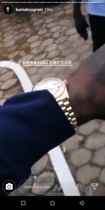 Music Director, Sesan Items Burna Boy Rolex watch valued at over N3 million