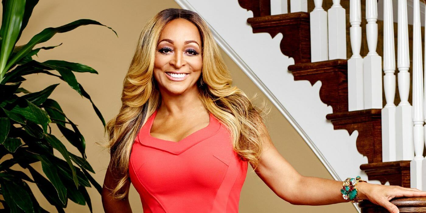 Karen Huger smiling in a promo image for Real Housewives of Potomac