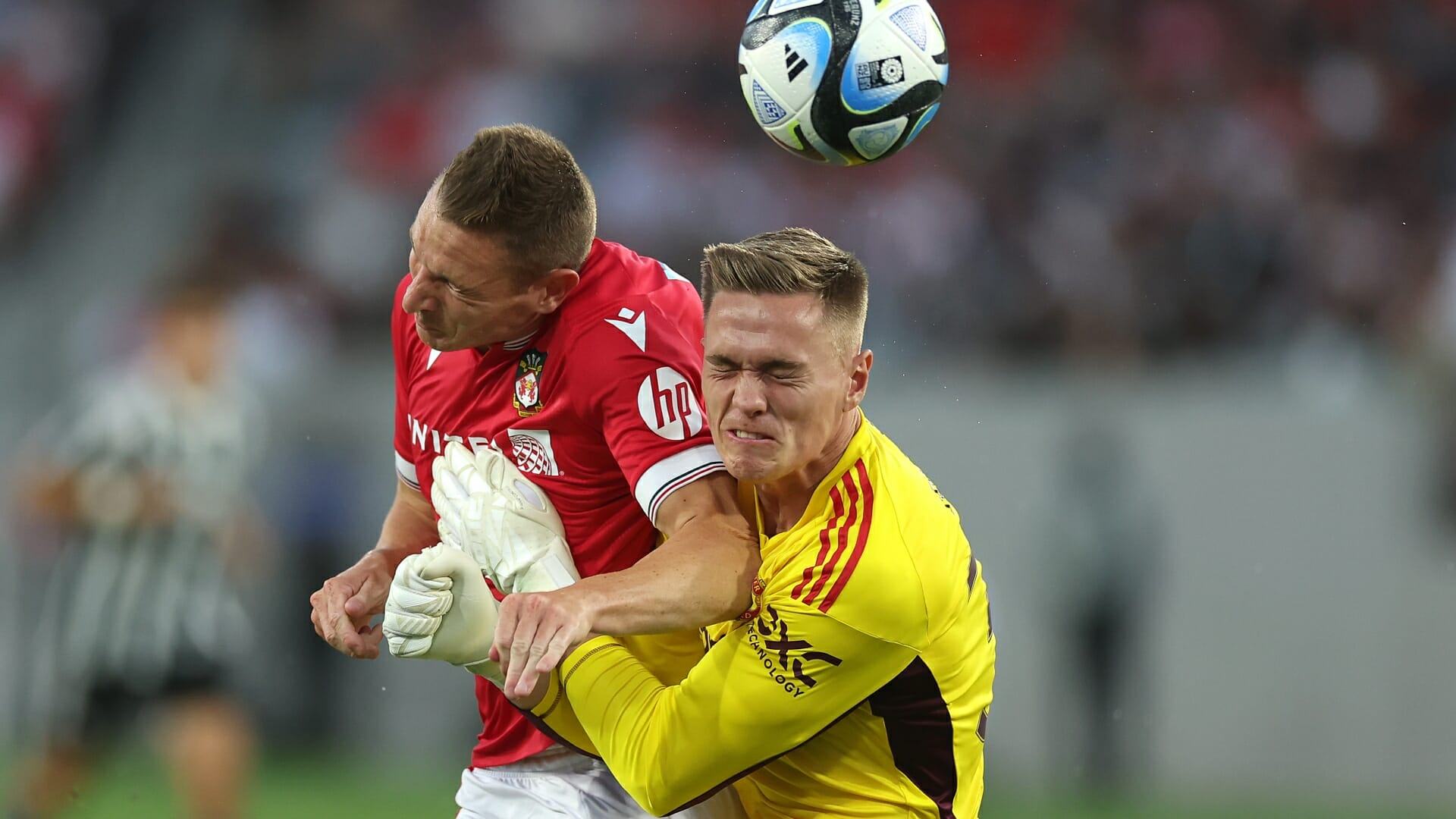 Raging Wrexham boss warns Man Utd keeper to 'steer clear' of him after puncturing Paul Mullin's lung in ugly clash