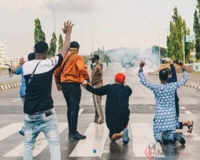 The Moment Davido Knelt Down Under The Rain With His Hands Up (Photos)