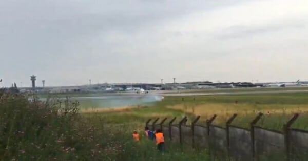 The environmental activists of Extinction Rebellion are introduced on a runway of Orly