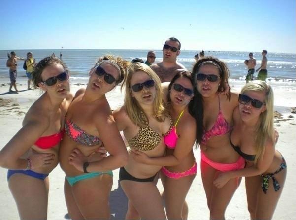 This photograph of six bikini babes has got viral for one VERY funny reason - can you see what it is?