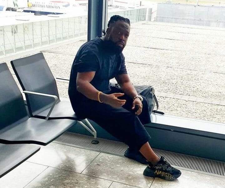 Timaya Off To America To Charge His Phone (Photo)