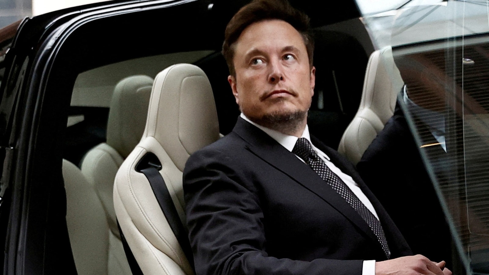 Elon Musk reacts to his Chinese Doppelgänger video, says he's...