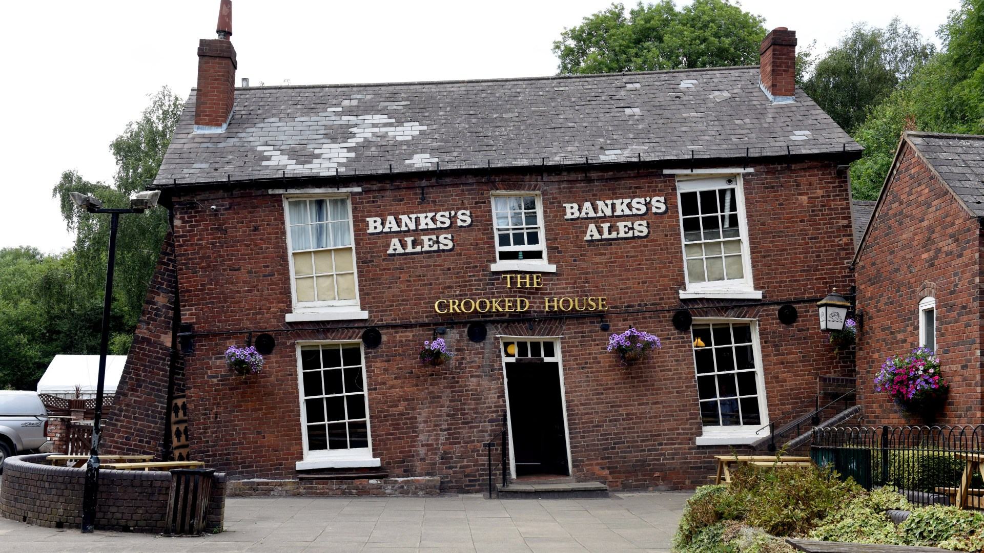 Inside toxic row over mystery fire that destroyed The Crooked House pub - including antique being removed before blaze