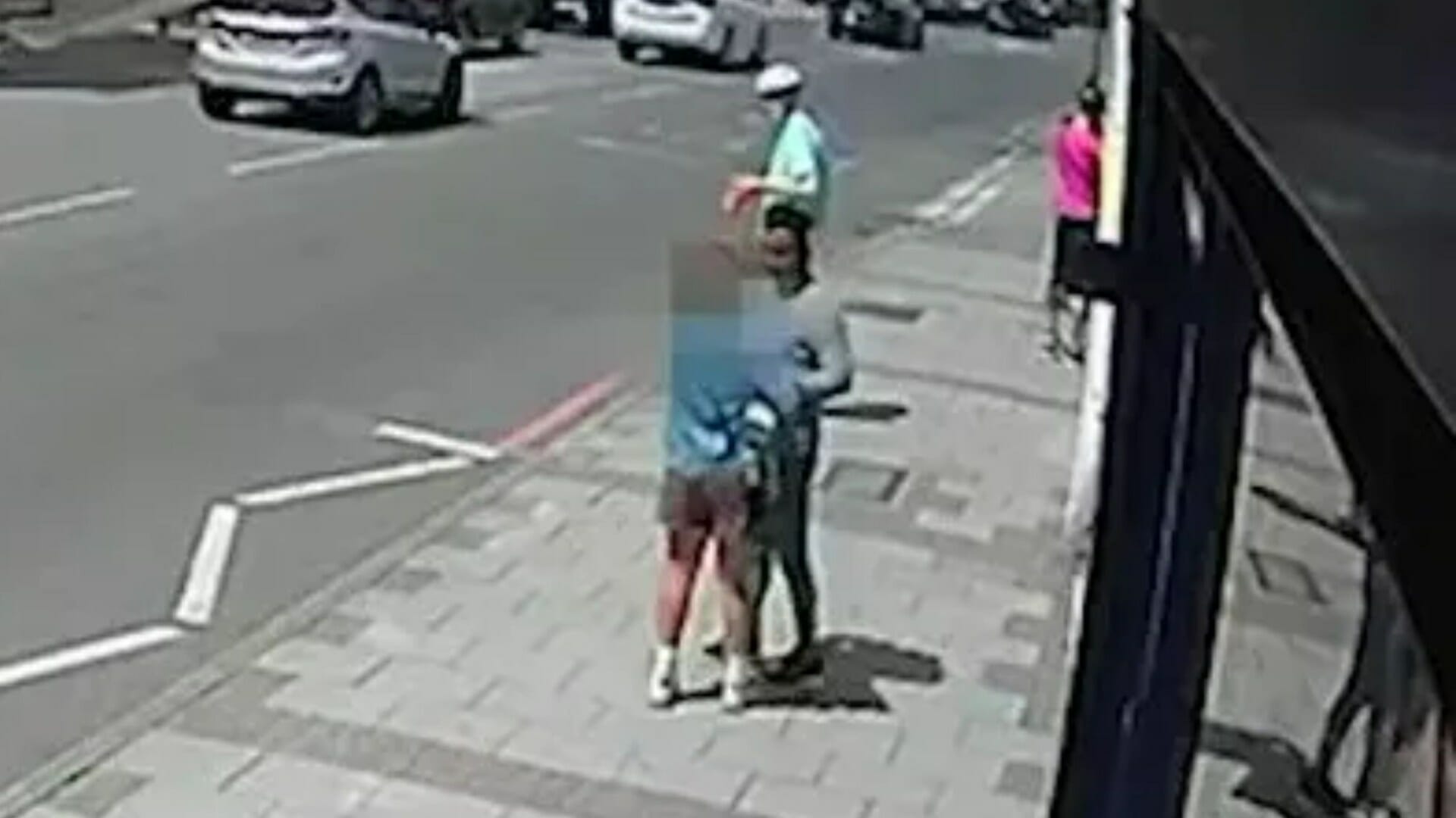 Terrifying moment man 'tries to snatch girl, 11, off the street in broad daylight' - before hero steps in to save her