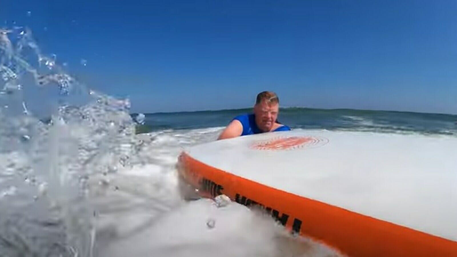 Surfer saves swimmer from deadly rip currents. Watch