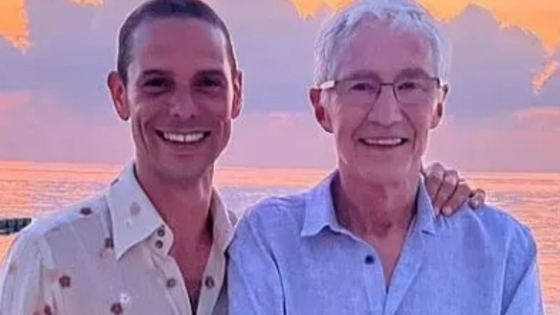 He lit a spliff and then passed away in his chair, says Paul O’Grady’s loving husband at emotional memorial