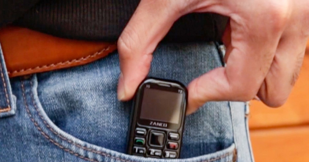 This tiny cell phone is the size of a USB stick, and it has a 7-day battery