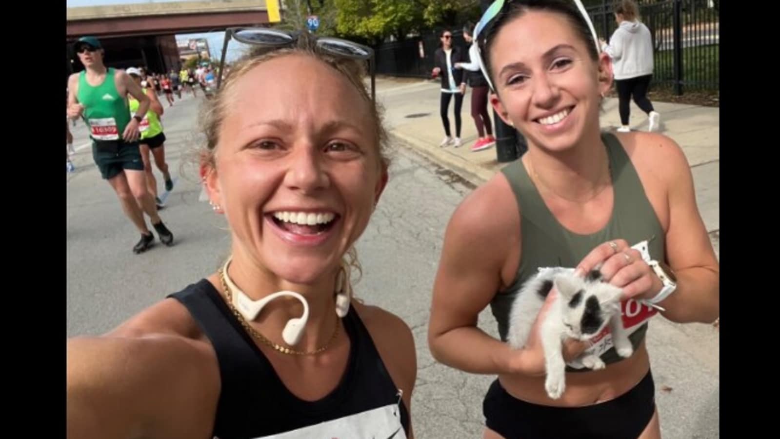 Woman rescues kitten while completing a marathon, Internet lauds her efforts