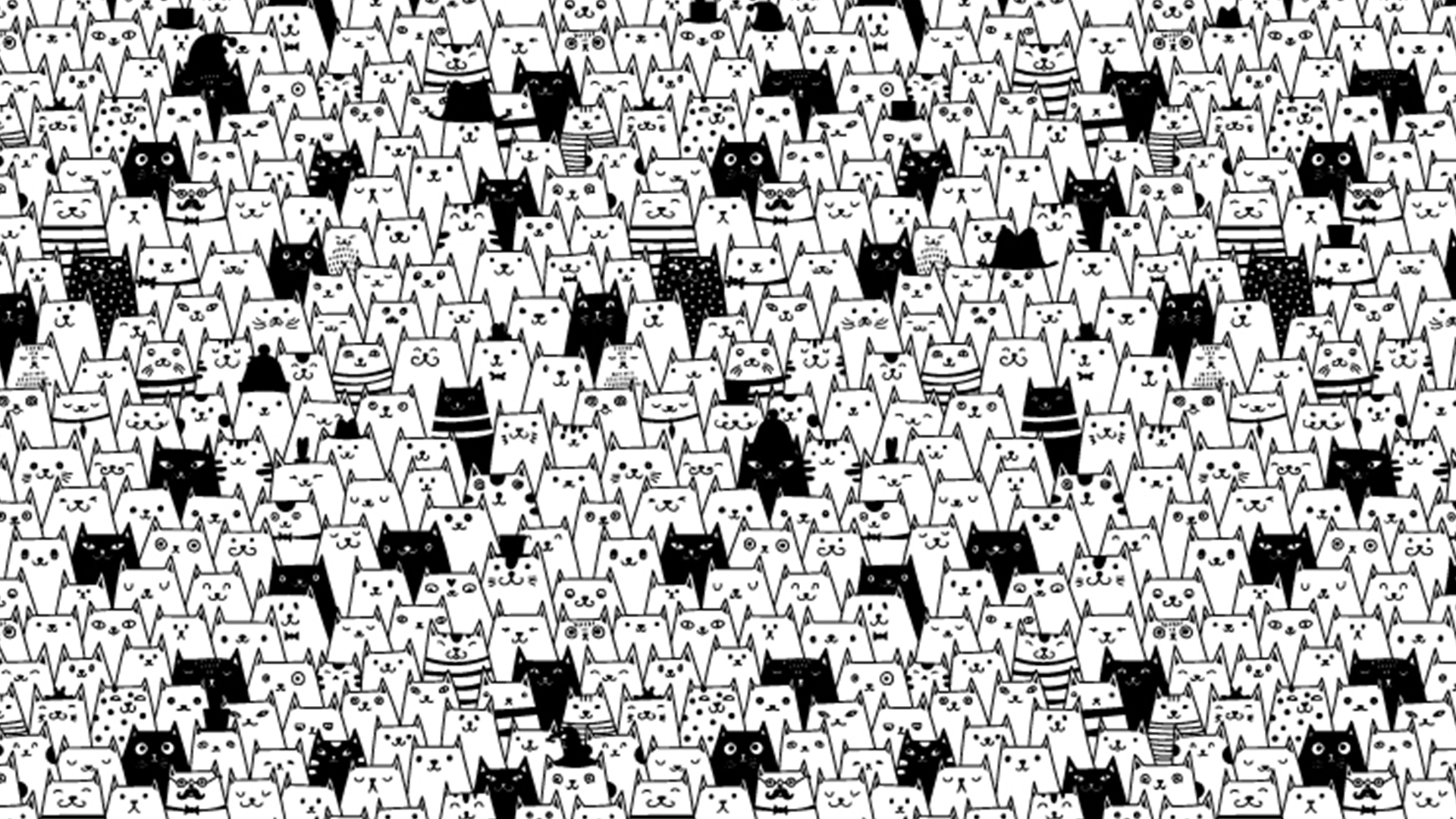 You have a high IQ if you can find the hidden black and white cat in the witch’s hat in under 30 seconds