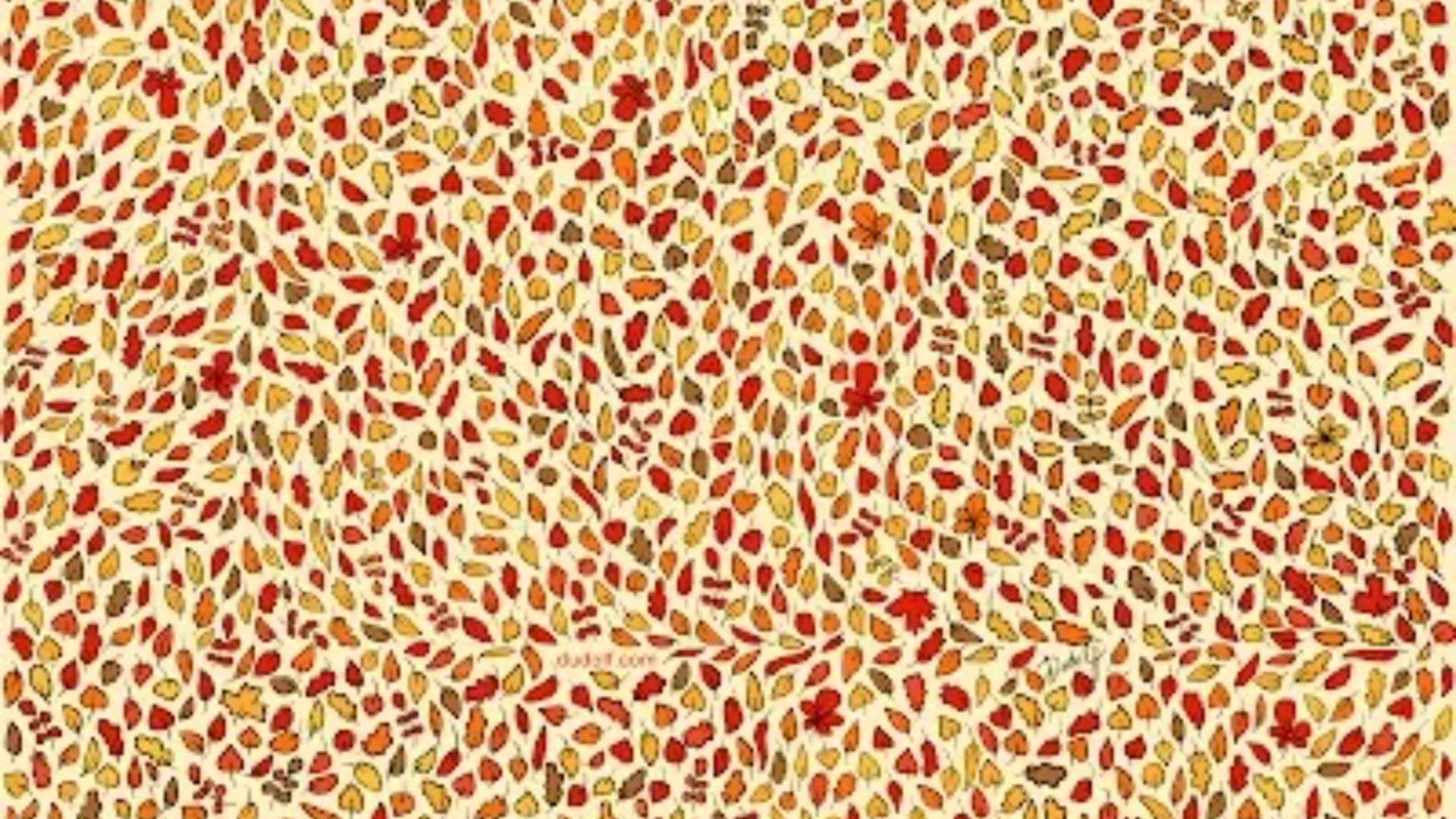 You have a high IQ if you can spot four apples hidden among the autumn leaves in under 15 seconds