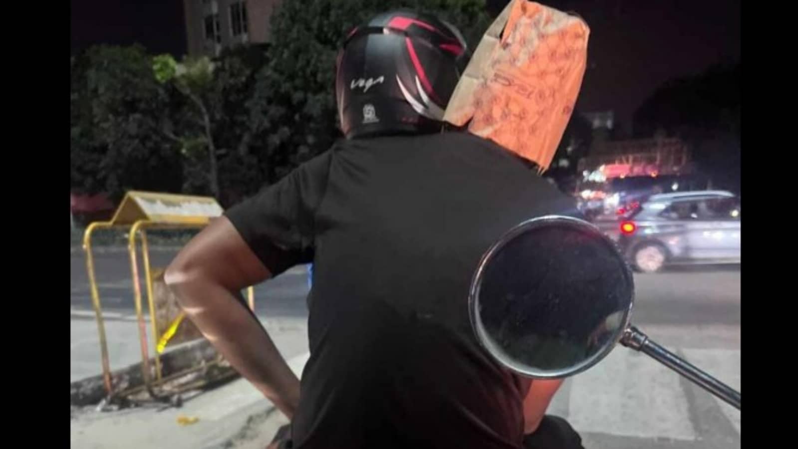 B'luru man wearing paper bag as helmet while riding pillion goes viral. See pic