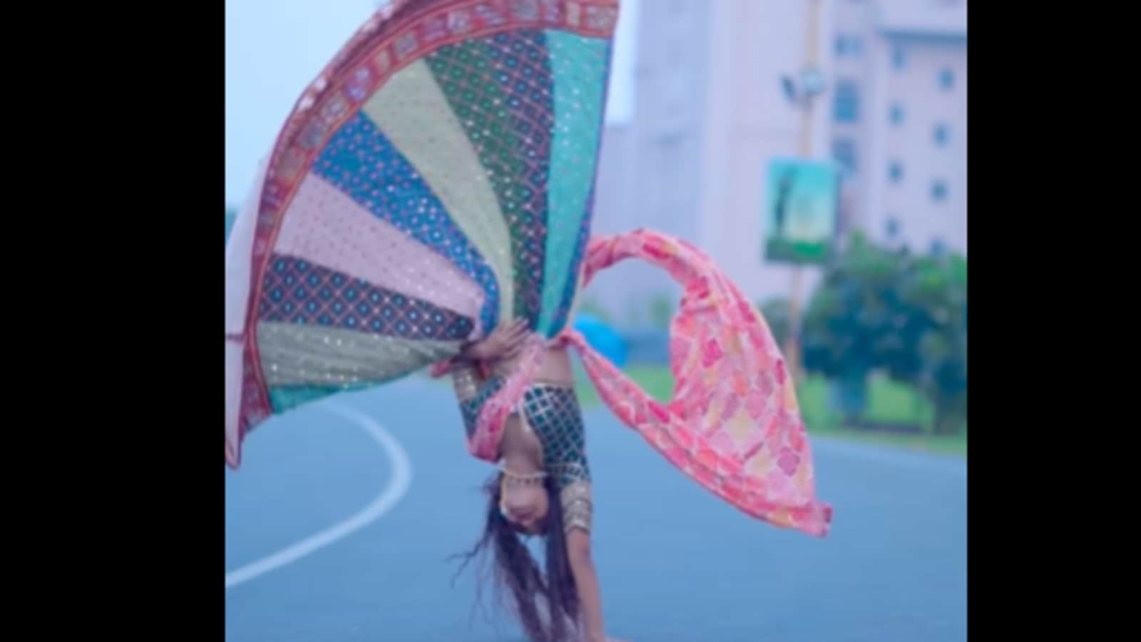 Woman effortlessly doing a somersault in lehenga wows the Internet. Watch